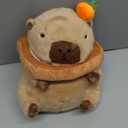 Ditucu Cute Capybara Plush Pillow with Wearable Donut Headgear Stuffed Animal Food Capibara Plushies Toys Gifts for Kids Brown 11 inch