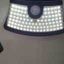 Aootek New Solar Motion Sensor Lights 120 LEDs with Lights Reflector,270 Wide Angle, IP65 Waterproof, Step Lights for Front Door, Yard, Garage, Deck (Black, Warm White, 4-Pack)