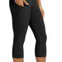 ODODOS Women's High Waisted Yoga Capris with Pockets, Tummy Control Non See Through Workout Athletic Running Capri Leggings (Large, Black)