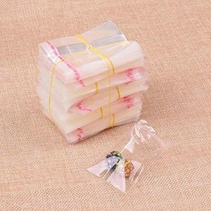 Bags 200pcs Small Transparent Plastic Bag Resealable Cellophane Poly Bags Nice Bag Self Adhesive Seal Candy Packaging Bags - (Bag Size: 3x5cm)