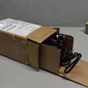 Amazon Basics 3-In-1 Electric Can Opener, Bottle Opener and Knife Sharpener, with Stainless Steel Blade, Magnetic Lid Holder, Automatic, Countertop, 50W, Black