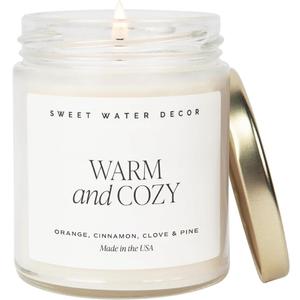 Sweet Water Decor Warm and Cozy Candle - Orange Peel, Cinnamon, Ginger and Clove Soy Winter Scented Candles for Home - 9oz Clear Jar + Gold Lid, 40+ Hour Burn Time, Made in The USA (Text Label)