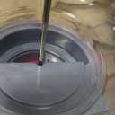 Vintage Gumball Machine - 11-Inch Retro-Style, Coin-Operated Cast Metal Vending Machine with Glass Globe and Free Spin by Great Northern Popcorn (Red)