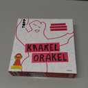 TOPP Krakel Oracle - The Drawing Game for All Who Can't Draw. Who Can Recognize the Oblique Shapes in the Line Tangle? 2-8 People | Ages 10+ | 30 Minutes