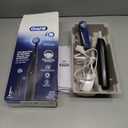Oral-B Rechargeable Electric Toothbrush, iO2 Starter Kit, 3 Cleaning Modes, Automatic Pressure Sensor to Protect Gums, 2 Brush Heads, Night Black