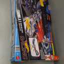 Hot Wheels Toy Car Track Set, Formula 1 Grand Prix Circuit Track Set with 3 1:64 Scale Die-Cast Toy Cars, Two Modes of Racing with a Motorized Booster