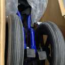 Medline Lightweight Foldable Transport Wheelchair with Handbrakes and 12-Inch Wheels, Blue Frame, Black Upholstery
