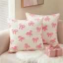 AVOIN colorlife Pink Bow Throw Pillow Covers Set of 2, 18 x 18 Inch Holiday Soft Plush Faux Fur Jacquard Cushion Case Decoration for Bedroom Home Sofa Couch
