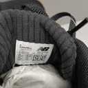 New Balance Women's Fresh Foam Arishi V4 Running Shoe (8 Wide, Black/Light Gold Metallic/Gum 2)