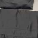 NICETOWN Pitch Black Solid Thermal Insulated Grommet Blackout Curtains/Drapes for Bedroom Window (2 Panels, 42 inches Wide by 63 inches Long, Black)