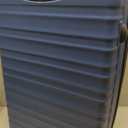 Amazon Basics 30" Hardside Large Checked Luggage with Multi-directional Wheels, Expandable for Up to 15% More Space, Scratch-Resistant Hardshell, Navy Blue