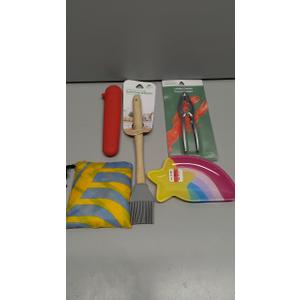 Red inflatable kneeling cushion / garden kneeler

Wooden-handled hand rake (with metal tines)

Pruning shears (in packaging)

Yellow and blue striped cushion/pillow

Star-shaped tray/scoop with rainbow design