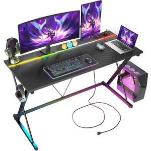 TIQLAB Gaming Desk with Power Outlets & LED 47 Inch Ergonomic Computer Carbon Fiber Surface Gamer Desk, PC Workstation with Headphone Hook for Bedroom, Kids Desk Gift for Boys, Black