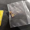 Pair of laboratory-grown diamond stud earrings with two round brilliant cut stones, total carat weight approximately 1.00 ct, color G–H, clarity VS1–VS2. Includes laboratory jewelry report dated December 28, 2024