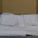 Bed Sheet Holders for Corners Keep Sheets Firm & Tight, Fitted Heavy Duty Mattress Sheet Corner Fasteners with Lock Straps, No More Loose Sheets & Easy Installation Set of 4 White