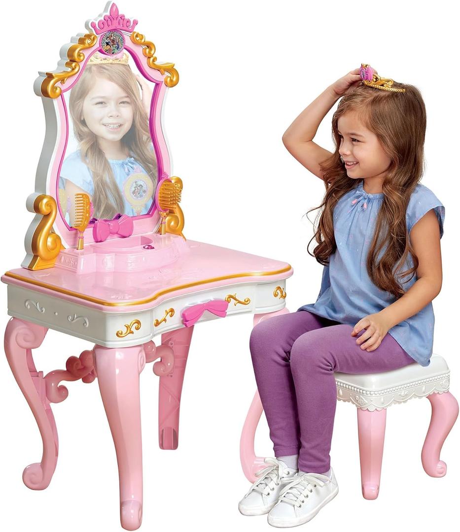 Disney Princess Ultimate Musical Vanity with Enchanting Messages & Celebration Song! Includes Brush, Comb, Tiara & 5 Rings Disney Princess Ultimate Musical Vanity with Enchanting Messages & Celebration Song! Includes Brush, Comb, Tiara & 5 Rings