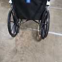 Medline Comfortable Folding Wheelchair with Swing-Back, Desk-Length Arms and Elevating Footrests, 20”W x 16”D Seat