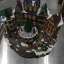 Christmas Village Centerpiece Decor, Tiered Village Town Center, with Rotating Train and Village Buildings, featuring LED Lights, Christmas Music, and Animation - Power Adapter (included) (17045)