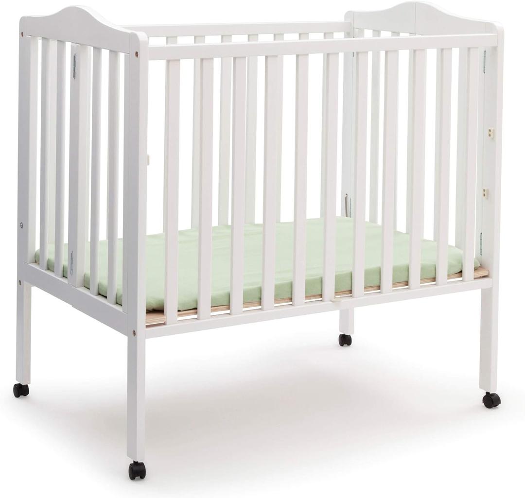 Delta Children Folding Portable Mini Baby Crib with 1.5-inch Mattress - Greenguard Gold Certified, White, 39"L x 25"W x 38"H