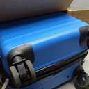 Amazon Basics 21" Hardside Carry-On Luggage with Expandable Space, Scratch-Resistant Surface, Telescoping Handle, Four Multi-directional Wheels, Light Blue
