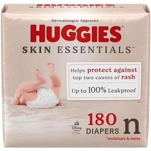 Huggies Size Newborn Diapers, Skin Essentials Baby Diapers, Size Newborn (6-9 lbs), 180 Count (3 Packs of 60), Packaging May Vary