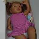 JIZHI Reborn Baby Dolls Black  22 Inch Lifelike Soft Body RealisticNewborn Baby Dolls Taupe Eyes Caramel Skin Tone Pink Striped Skirt Real Life and Toy Accessories Gift for Kids Age 3