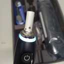 Oral-B Rechargeable Electric Toothbrush, iO9 Limited Ultimate Clean, 7 Cleaning Modes, Interactive Display, iSense Charger, Charging Travel Case, Visible Pressure Sensor, 3 Brush Heads, Black