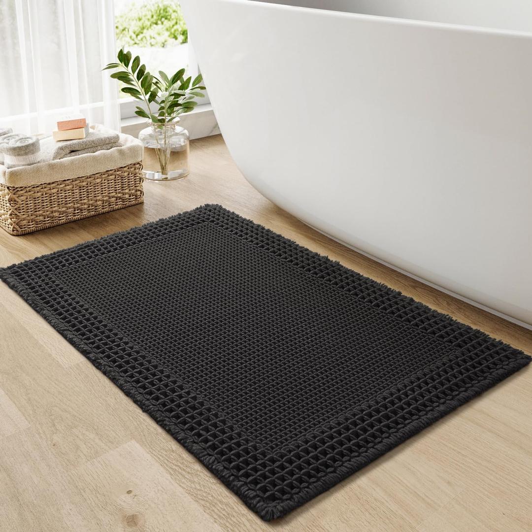 RESARE Waffle Bath Mat for Bathroom, Super Absorbent Bathroom Rugs Non Slip Machine Washable, Ultra Soft Quick Dry Boho Bath Rugs with Tassels for Floor, Upgraded Bordered Design, 18"x30" Black (1'6" x 2'6" (Rectangular))