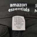 Amazon Essentials Women's Mid-Rise Stretchy Skinny Jeans (8 Long, Black)