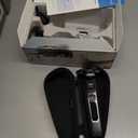 Philips Norelco Shaver 7300, Rechargeable Wet & Dry Electric Shaver with SenseIQ Technology, Pop-up Trimmer, Charging Stand, Click-on Nose Trimmer, & Travel Case, S7887/92