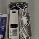 OralB iO Series 2 Rechargeable Electric Powered Toothbrush Starter Kit, Night Black with 2 Brush Heads  Automatic Pressure Sensor to Protect Gums  3 Modes  2 Min Timer