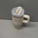 STANLEY Quencher H2.0 Tumbler with Handle and Straw 20 oz | Flowstate 3-Position Lid | Cup Holder Compatible for Travel | Insulated Stainless Steel Cup | BPA-Free | Cream 2.0