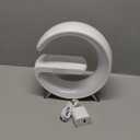 Smart LED Table Lamp, 4-in-1 Wireless Charger, Night Light, Alarm Clock, and Bluetooth Speaker with App Control for Bedroom, Office, and Home Decor (White)