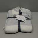 DI MODAVARI WOVEN 50X70 THROW-LT GREY