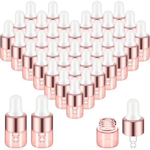 Didaey Mini Glass Oil Dropper Bottle Bulk, Clear Essential Small Empty Bottles Sample Containers Perfume Liquid Vials with Cap for Traveling (1 ml,Pink Body)