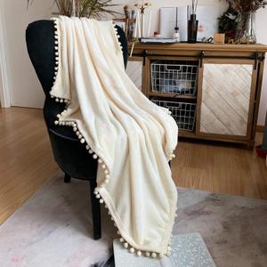 LOMAO Flannel Blanket with Pompom Fringe Lightweight Cozy Bed Blanket Soft Throw Blanket fit Couch Sofa Suitable for All Season(Ivory, 51''x 63'')