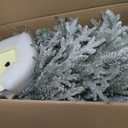 Puleo International 6ft Pre-Lit Potted Flocked Arctic Fir Pencil Christmas Tree with 120 Warm White Lights, 1325 Realistic Dense Snow Flocked Branch Tips, Easy Setup Artificial Trees with Sturdy Stand
