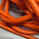 Amazon Basics 100 foot 3-Prong Vinyl Indoor/Outdoor Extension Cord - 10 Amps, 1250 Watts, 125 VAC - Orange