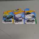 Pack Of 3 Hot Wheels Cars (VolvoXC40, Rink Racer, 08 Ford Focus)