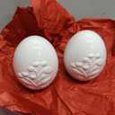 2 White Ceramic Eggs With Embossed Flowers