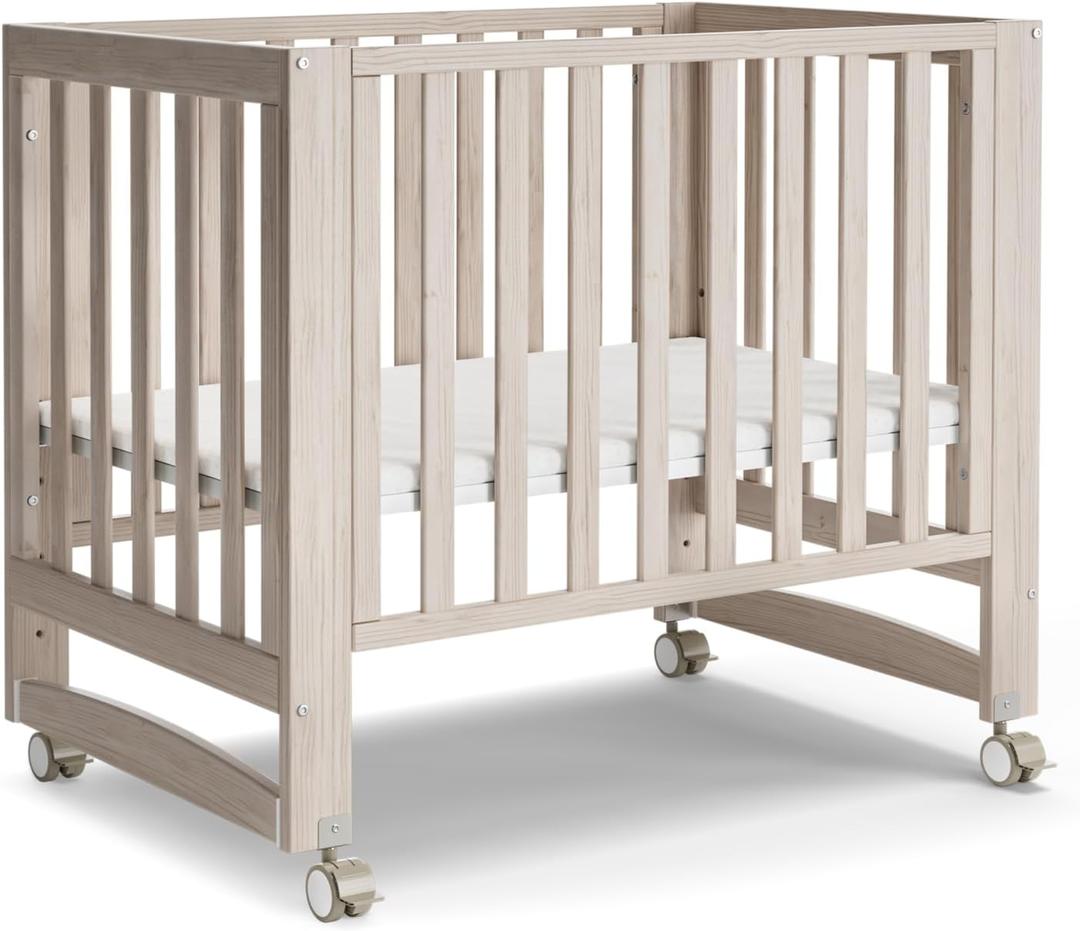 MAMAZING EvoNest Baby Crib, 3 in 1 Convertible Mini Crib with Wheels, 100% New Zealand Wood Crib, 4 Adjustable Mattress Height, GREENGUARD Gold Certified, Washed Natural, 40.1"L x 25.7"W x 35.4"H
