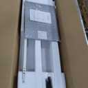 HUANUO Electric Standing Desk, 63 x 24 Inch Height Adjustable Computer Desk with Storage Bag, 4 Height Memory Settings, Sit Stand Up Desk for Home Office, White