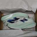 New Balance Women's FuelCell Rebel V4 Running Shoe, Clay Ash/ White/ Black, 6