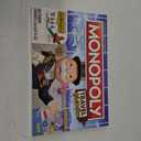 Hasbro Gaming Monopoly World Tour Board Game with Token Stampers and Dry-Erase Gameboard for Family Game Night