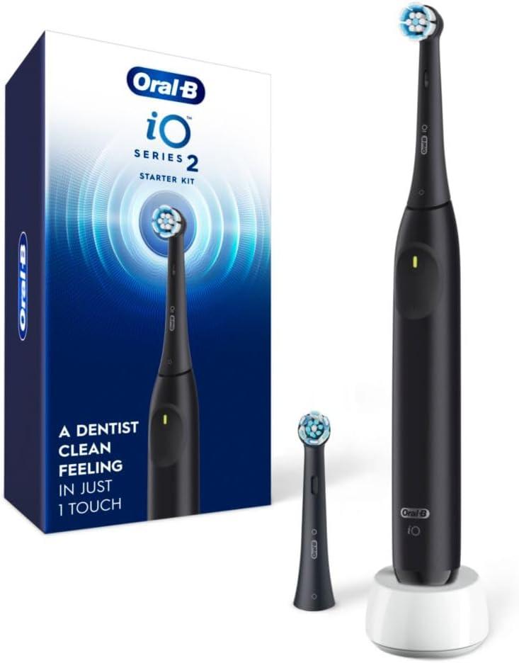 OralB Rechargeable Electric Toothbrush, iO2 Starter Kit, 3 Cleaning Modes, Automatic Pressure Sensor to Protect Gums, 2 Brush Heads, Night Black