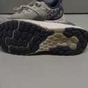 New Balance Unisex-Child Fresh Foam Arishi V4 Lace-upRunning Shoe (4 Big Kid, Grey Matter/Vintage Indigo/Melon Water)