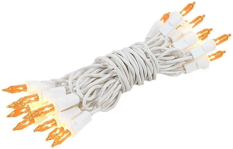 Novelty Lights 8.5 Feet 20 Bulb Amber Mini Light String on White Wire, Non-Connectable Incandescent Fairy Lights for Bottles and Crafts, 4" Bulb Spacing, 24" Lead, Stackable Fused Plug