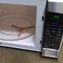 GE Countertop Microwave Oven, 1, 200-watt Capacity, 2.0 Cubic Ft., 8 Auto Setting Cooking Settings, Child-Lock Technology, Kitchen Essentials for the Countertop, Dorm Room or Apartment, Stainless Steel