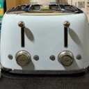 SMEG 4 Slice Toaster TSF03, Retro Stainless-Steel Toaster with Wide Slots for Bagels, 6 Browning Levels, Defrost Reheat Bagel Functions, Dual Controls, Crumb Trays, 1800W - TSF03PBUS - Pastel Blue