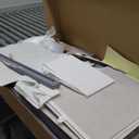 Badger Basket Sleigh-Style Baby Changing Table - Diaper Changing Station with 3 Storage Baskets - Nursery Organizer with Hamper, Changing Pad, Safety Rails - Gray